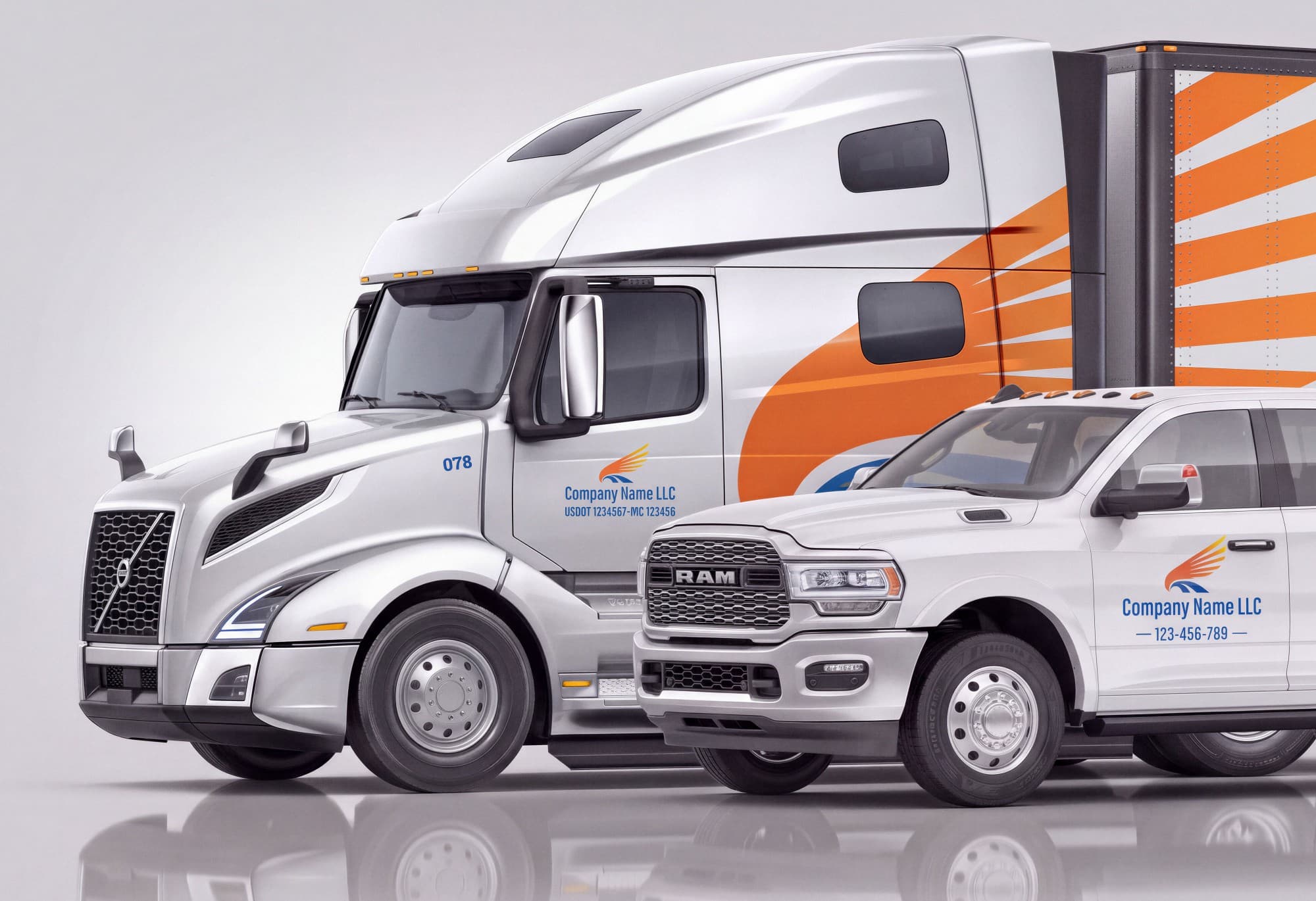 Fleet vehicles lettered with a company name, USDOT and MC numbers